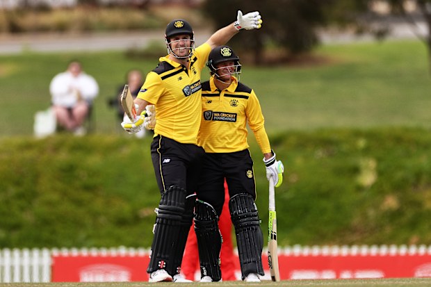 Mitchell Marsh of Western Australia celebrates after reaching his century during the Marsh One-Day Cup match between South Australia and Western Australia at Karen Rolton Oval.