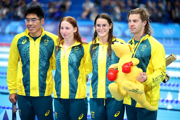 Bronze Medalists Kaylee McKeown, Joshua Yong, Matthew Temple and Mollie O'Callaghan of Team Australia poses following the Swimming medal ceremony after the Mixed 4x100m Medley Relay Final on day eight of the Olympic Games Paris 2024 at Paris La Defense Arena on August 03, 2024 in Nanterre, France. (Photo by Adam Pretty/Getty Images)