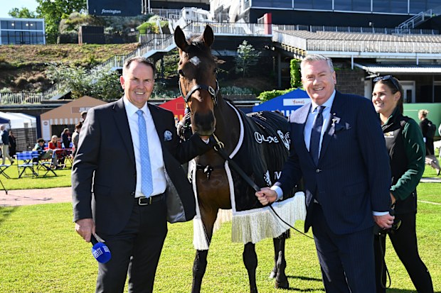 MELBOURNE, AUSTRALIA - OCTOBER 27: Channel nine commentators Tony Jones and Eddie McGuire pose with Cup winner Twilight Payment during the 2025 Melbourne Cup Carnival Launch at  on October 27, 2025 in Melbourne, Australia. (Photo by Vince Caligiuri/Getty Images)