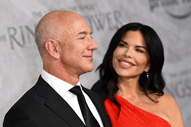 Jeff Bezos and Lauren Sánchez attend The Lord of the Rings: The Rings of Power World Premiere at Odeon Luxe Leicester Square on August 30, 2022 in London, England. 