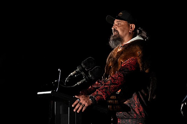 Uncle Mark Brown conducts the Welcome to Country during Saturday's dawn service at the Shrine of Remembrance.