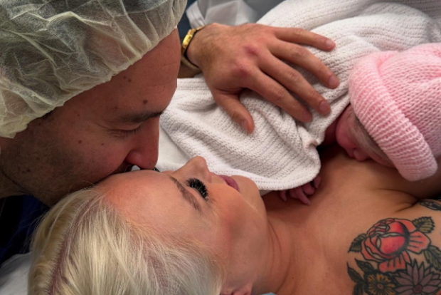 Political power couple Victorian Animal Justice MP Georgie Purcell and Federal Labor MP Josh Burns have welcomed their first child together at a time when her Jewish father "needed some light in the darkness".