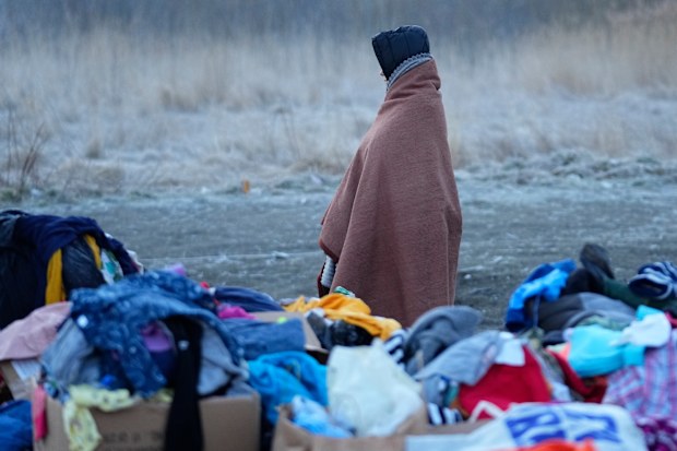 A refugee fleeing conflict in Ukraine arrives to Przemysl, Poland, Sunday, Feb. 27, 2022. 