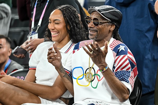 American rapper and actor Snoop Dogg alongside US basketball player A'ja Wilson.