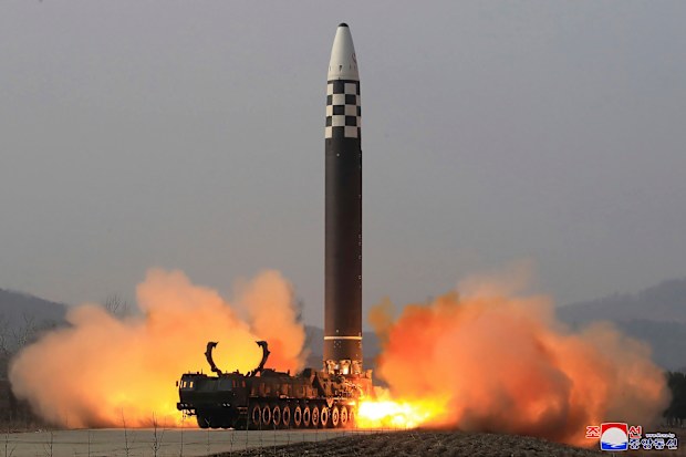 This photo distributed by the North Korean government shows what it says is a test-fire of a Hwasong-17 intercontinental ballistic missile. 