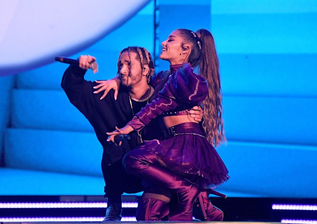 Ariana Grande performs with Mikey Foster