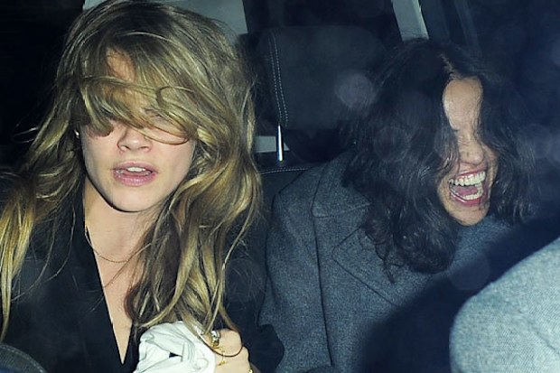 Backseat romp! Cara Delevingne leaves cab with girlfriend Michelle Rodriguez's pants...