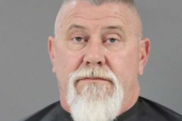 US man Robert Rigdon, who has been arrested after allegedly shooting his neighbour's dog.