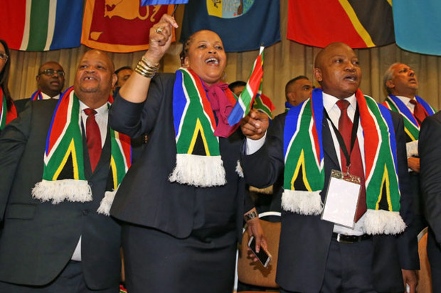 Dignatories from South Africa celebrate Durban's winning Commonwealth Games bid. (Getty)