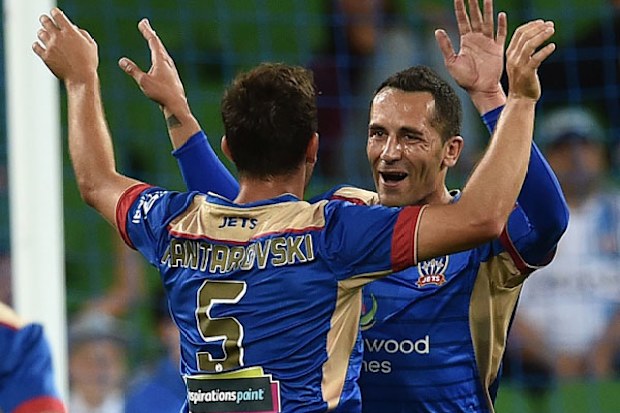 The Newcastle Jets celebrate a goal in the 3-2 win. (AAP)