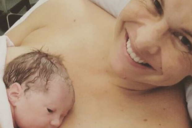 Libby Trickett with her new daughter, Poppy. (Supplied)