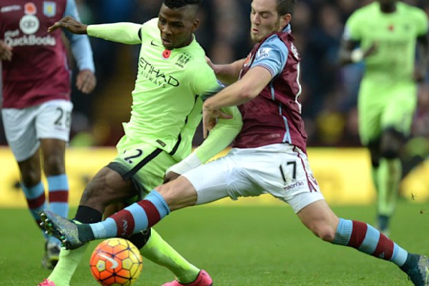 Manchester City's Nigerian striker Kelechi Iheanacho (L) is tackled by Aston Villa's French midfielder Jordan Veretout. (AFP)