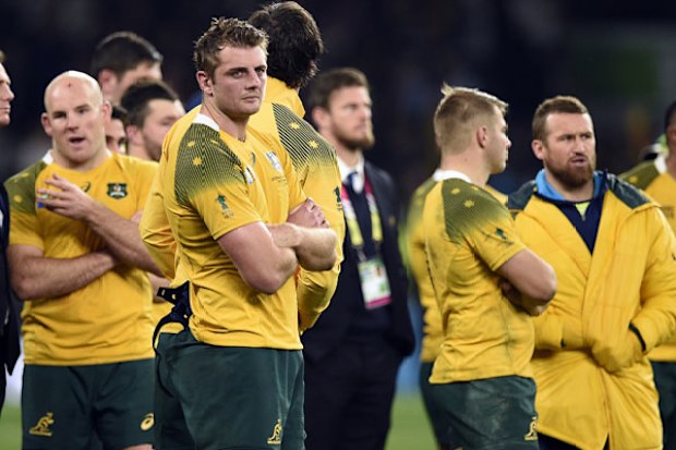 The Wallabies react to the loss against the All Blacks. (AFP)