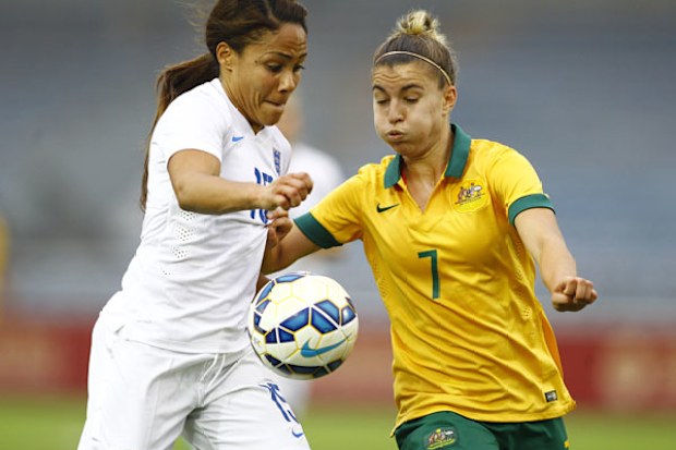 Australia's Stephanie Catley challenges England's Alex Scott for the ball. (Getty)
