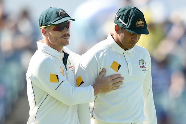 David Warner consoles Usman Khawaja. (AAP)