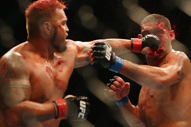 Mark Hunt puts a clean shot on Antonio "bigfoot" Silva during their first UFC fight in 2013. (Getty)