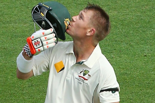 David Warner celebrates scores a century against New Zealand. (Getty)