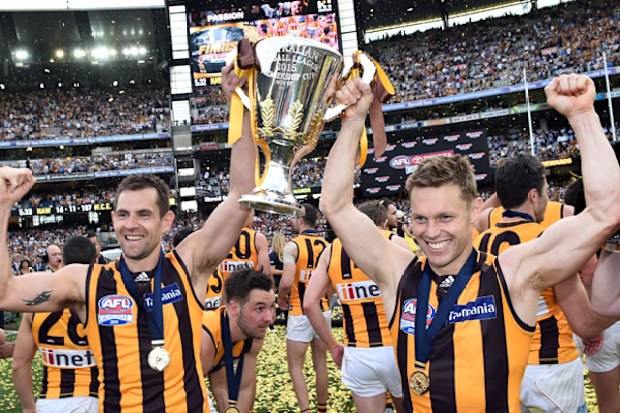 The Hawks celebrate last season's grand final triumph. (AAP)