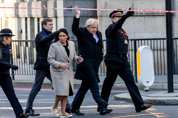 British Prime Minister Boris Johnson with Home Secretary, Priti Patel, visits the crime scene with City of London Police Commissioner Ian Dyson and Commissioner Cressida Dick near London Bridge in London.