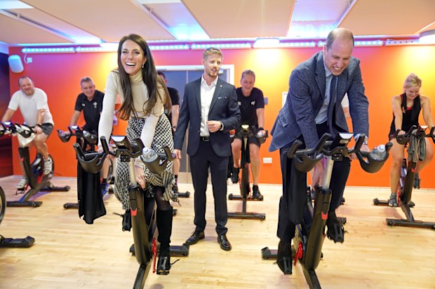 Prince William, Prince of Wales and Catherine, Princess of Wales take part in a spin class during a visit to Aberavon Leisure and Fitness Centre in Port Talbot, to meet local communities and hear about how sport and exercise can support mental health and wellbeing on February 28, 2023 in Port Talbot, United Kingdom. 