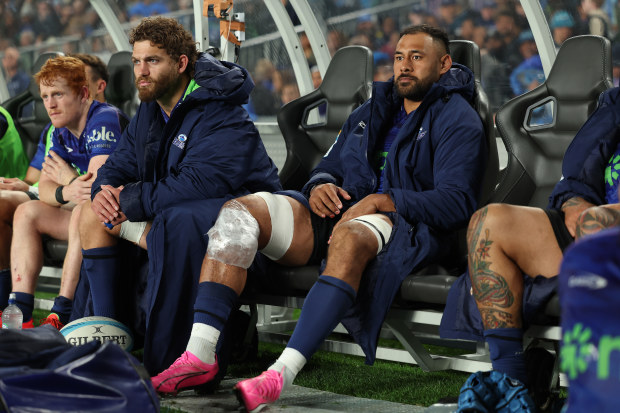 Patrick Tuipulotu sits on the bench during the Super Rugby Pacific quarter final match between the Blues and Fijian Drua.