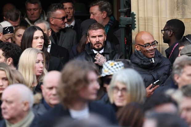 MANCHESTER, ENGLAND - DECEMBER 22: David Beckham attends the funeral of Gary Mounfield, also known as Mani, at Manchester Cathedral on December 22, 2025 in Manchester, England. Mani is know for being the bass guitarist in rock bands The Stone Roses and Primal Scream. He died on November 20, 2025 at the age of 63 after suffering from a long-standing lung condition. (Photo by Ryan Jenkinson/Getty Images)