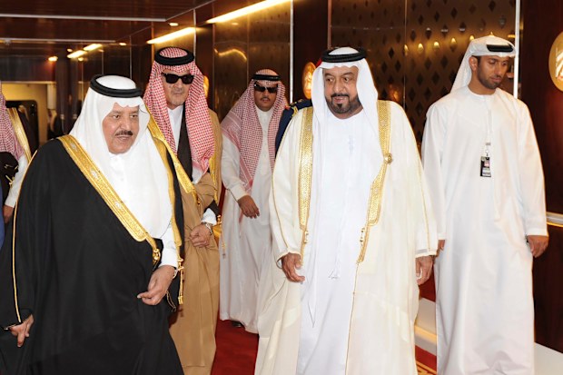 In this image made available by Emirates News Agency, WAM, UAE President Sheikh Khalifa bin Zayed Al Nahyan, 2nd right, walks with Saudi Arabia's Prince Nayef bin Abdul Aziz, 3rd left, and Saudi Foreign Minister Prince Saud Al Faisal, 4th left, during the 31st Gulf Cooperation Council, GCC summit in Abu Dhabi, Monday, Dec. 6, 2010. 