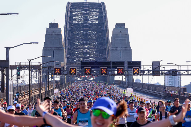 Participants of the Sydney Marathon crossing the Sydney Harbour Bridge.
