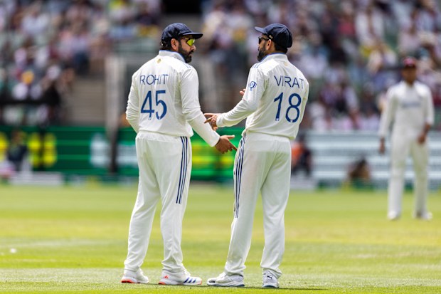 Virat Kohli has a chat with Rohit Sharma during day four of the Boxing Day Test match.