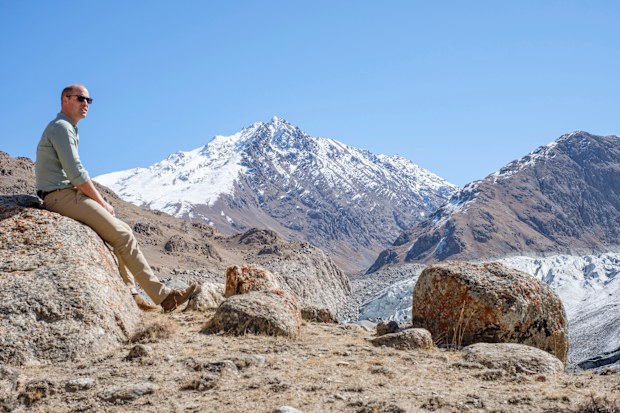 In this Oct. 2019 handout photo provided by Kensington Palace and released on Tuesday, Dec. 31, 2019, Britain's Prince William sits at a glacier in the Hindu Kush mountain range, situated in the Chitral District of Pakistans Khyber-Pakhtunkwa Province. Prince William is kick-starting 2020 with a new drive to dispel the current pessimism around the environment and replace it with fresh optimism and action, by announcing The Earthshot Prize: an ambitious set of challenges initiating global, cross-