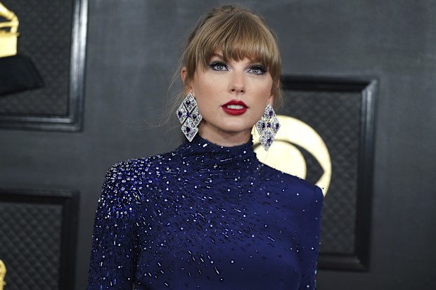 Taylor Swift arrives at the 65th annual Grammy Awards on Sunday, Feb. 5, 2023, in Los Angeles. 
