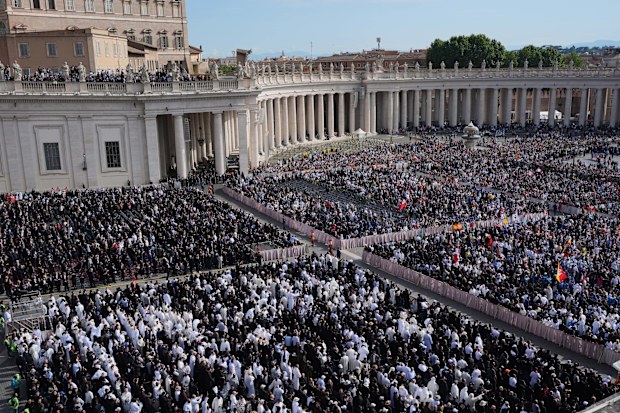  Guests and the faithful attend the inaugural Mass of Pope Leo XIV.