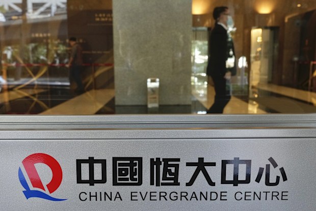 A security guard at the headquarters of China Evergrande Group in Hong Kong in October.