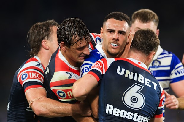 SYDNEY, AUSTRALIA - MAY 16: Jacob Kiraz of the Bulldogs is tackled during the round eleven NRL match between Bulldogs and Roosters at Accor Stadium, on May 16, 2025, in Sydney, Australia. (Photo by Mark Evans/Getty Images)