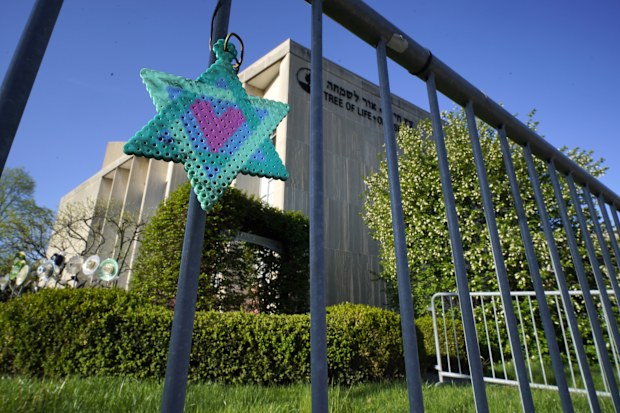 A Star of David hangs from a fence outside the dormant landmark Tree of Life synagogue in Pittsburgh's Squirrel Hill neighbourhood, Apr. 19, 2023. 