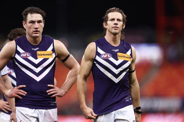 SYDNEY, AUSTRALIA - JUNE 17: Nat Fyfe of the Dockers and team mates look dejected after the round 14 AFL match between Greater Western Sydney Giants and Fremantle Dockers at GIANTS Stadium, on June 17, 2023, in Sydney, Australia. (Photo by Matt King/AFL Photos/via Getty Images )