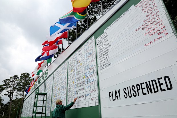 AUGUSTA, GEORGIA - APRIL 07: Signage that reads  'Play Suspended' due to weather on the leaderboard during the second round of the 2023 Masters Tournament at Augusta National Golf Club on April 07, 2023 in Augusta, Georgia. (Photo by Andrew Redington/Getty Images)