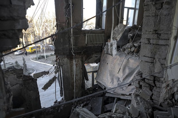 A damaged part of the hospital of Donetsk Clinical Territorial Medical Association is seen after what Russian officials in Donetsk said it was a shelling by Ukrainian forces, in Donetsk, in Russian-controlled Donetsk region, Ukraine, Tuesday, Dec. 20, 2022.