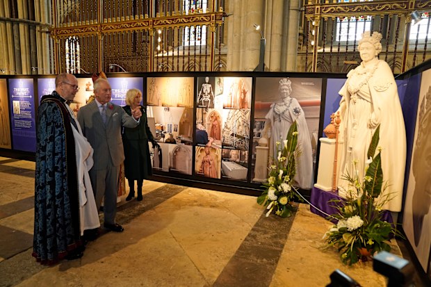 King Charles III of the United Kingdom and Camilla, Queen Consort are shown a scaled replica of the statue of Queen Elizabeth II that they will unveil later during a visit to York Minster and to meet people from the Cathedral and the City of York, during an official visit to Yorkshire on November 9, 2022 in York, England