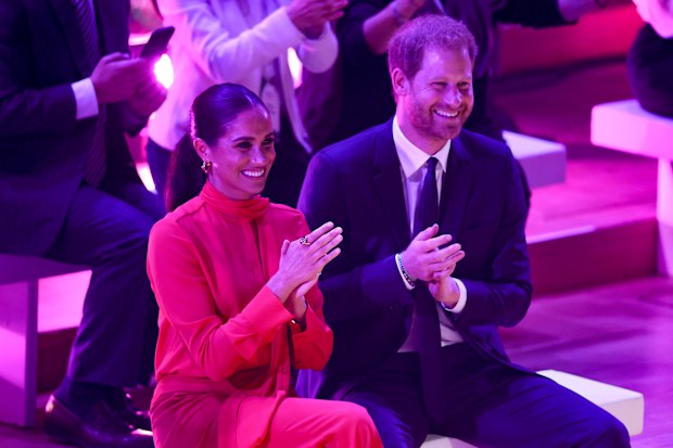 MANCHESTER, ENGLAND - SEPTEMBER 05: Meghan, Duchess of Sussex and Prince Harry, Duke of Sussex clapping during the Opening Ceremony of the One Young World Summit 2022 at The Bridgewater Hall on September 05, 2022 in Manchester, England. The annual One Young World Summit brings together more than two thousand of the brightest young leaders from every country and sector, working to accelerate social impact both in-person and digitally. Meghan is a counsellor for the organisation, alongside Justin 