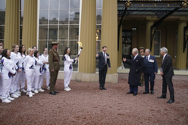 King Charles III, third right, attends the start of the Australian Legacy Torch Relay to mark the beginning of the London-leg of the charity's relay race in celebration of their centenary year at Buckingham Palace in London, Friday April 28, 2023.  