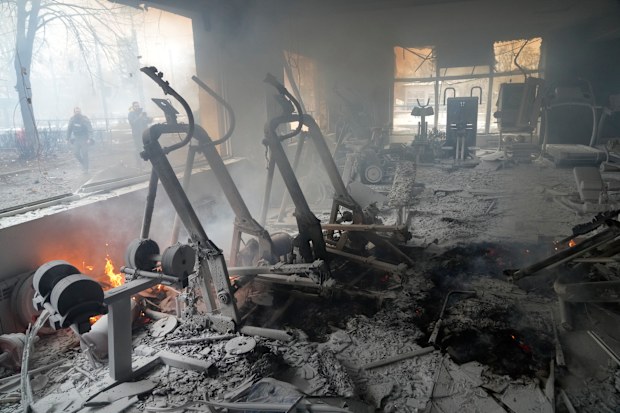 A view of smoke from inside a damaged gym following shelling in Kyiv, Ukraine, Wednesday, March 2, 2022. 
