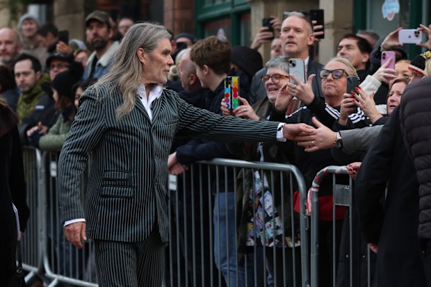 MANCHESTER, ENGLAND - DECEMBER 22: Ian Brown attends the funeral of Gary Mounfield, also known as Mani, at Manchester Cathedral on December 22, 2025 in Manchester, England. Mani is know for being the bass guitarist in rock bands The Stone Roses and Primal Scream. He died on November 20, 2025 at the age of 63 after suffering from a long-standing lung condition. (Photo by Ryan Jenkinson/Getty Images)