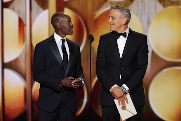 Don Cheadle, George Clooney at the 83rd Annual Golden Globes held at The Beverly Hilton on January 11, 2026 in Beverly Hills, California. (Photo by Rich Polk/2026GG/Penske Media via Getty Images)