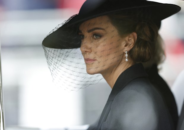 Kate Middleton, Princess of Wales, is driven down The Mall after the funeral for  HM Queen Elizabeth II's funeral in London, United Kingdom. 19 September 2022. Tom Jenkins for The Guardian / POOL.