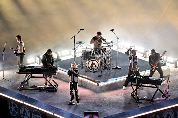 Emily Armstrong, Lead Singer of Linkin Park performs with Mike Shinoda, Singer of Linkin Park, Brad Delson, Lead Guitarist of Linkin Park and Dave Pharrell, Bass Player of Linkin Park during the pre match ceremony prior to the UEFA Champions League Final 2025 between Paris Saint-Germain and FC Internazionale Milano at Munich Football Arena on May 31, 2025 in Munich, Germany. 