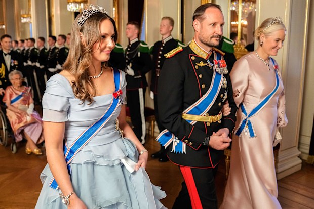 From left, Norway's Princess Ingrid Alexandra, Crown Prince Haakon and Crown Princess Mette-Marit on their way to a gala dinner at the Palace in connection with the state visit of the Icelandic presidential couple, in Oslo, Tuesday, April 8, 2025. (Fredrik Varfjell/NTB via AP)