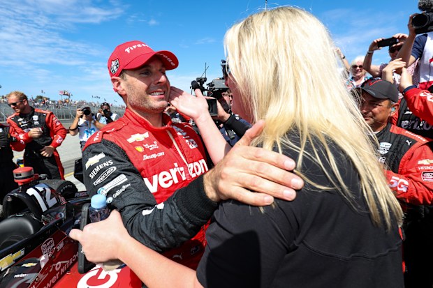 Will Power (left) and Liz Power after the Australian won the 2022 IndyCar Series title.