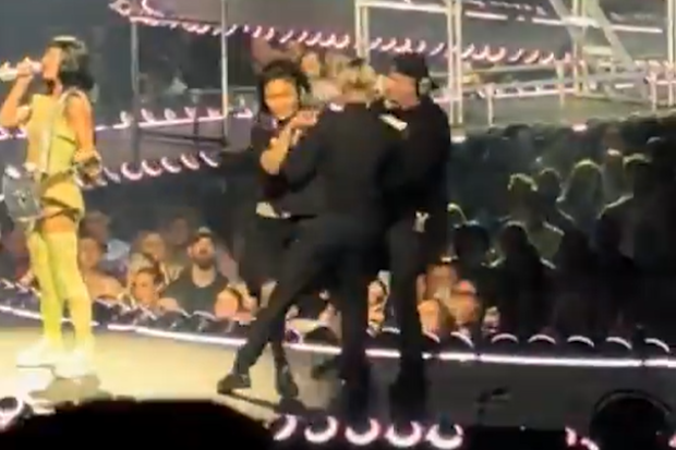 Fan storms the stage during Katy Perry concert
