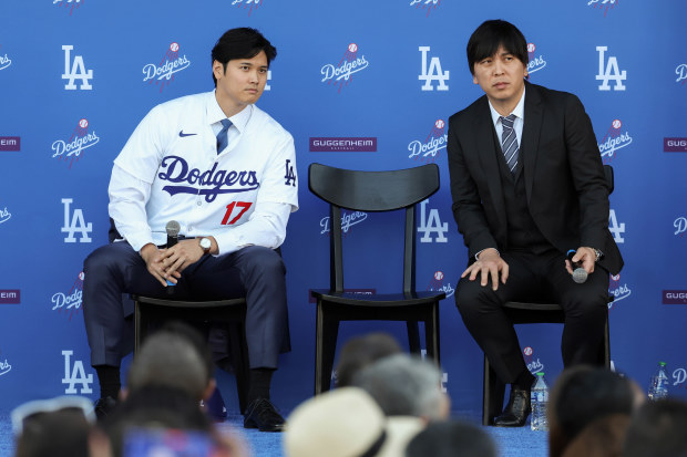 Shohei Ohtani answers questions and Ippei Mizuhara translates during the Shohei Ohtani Los Angeles Dodgers Press Conference at Dodger Stadium on Thursday, December 14, 2023 in Los Angeles, California. (Photo by Rob Leiter/MLB Photos via Getty Images)
